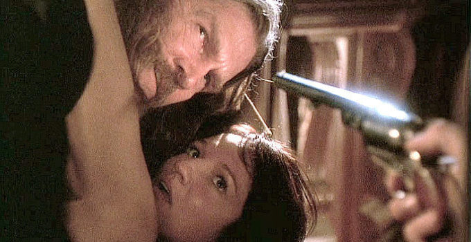 Jeff Bridges as Wild Bill Hickok and Ellen Barkin as Calamity Jane, facing a poorly timed interruption in Wild Bill (1995)