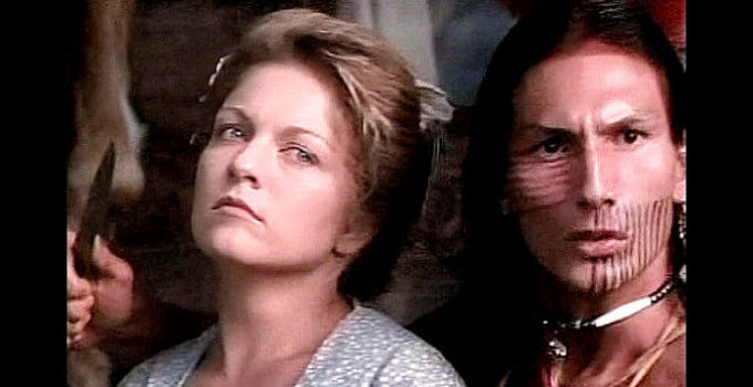 Sheryl Lee as Mary Ingles is taken captive at knifepoint by a Shawnee warrior in Follow the River (1995)