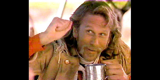 Peter Horton as George Armstrong Custer, sharing news of a gold strike in Crazy Horse (1996)