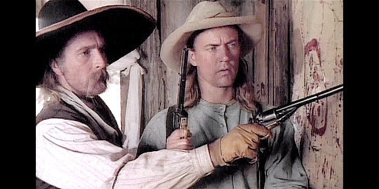 R.J. Preston as Ben Logan and Barry Tubb as Need Hawks plot their next step in Blood Trail (1997)