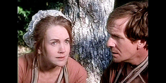Renee O'Connor as Bettie Draper with fellow captive Henry Lenard (Andy Stahl) in Follow the River (1995)