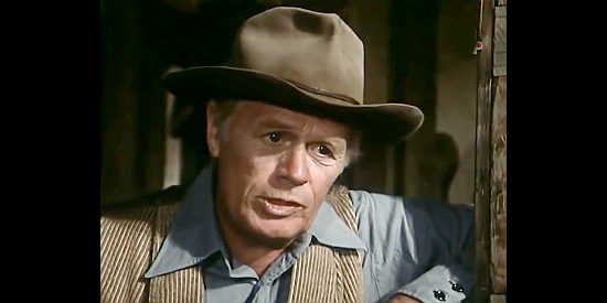Richard Widmark as Will Spence, a former gunman trying to put his past in the past in The Last Day (1975)
