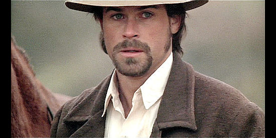 Rob Lowe as Jesse James, looking for a measure of vengeance in Frank and Jesse (1994)