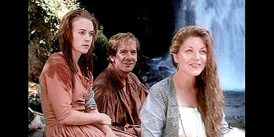 Sheryl Lee as Mary Ingles, joking with her captors while Bettie Draper (Renee O'Connor) and Henry Lenard (Andy Stahl) look on in Follow the River (1995)