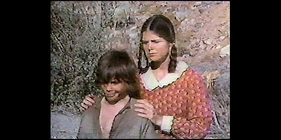 Susan Myers as Amy and Tiger Williams as Charlie, the orphans Benjamin Ward takes under his wing in Desperate Women (1978)
