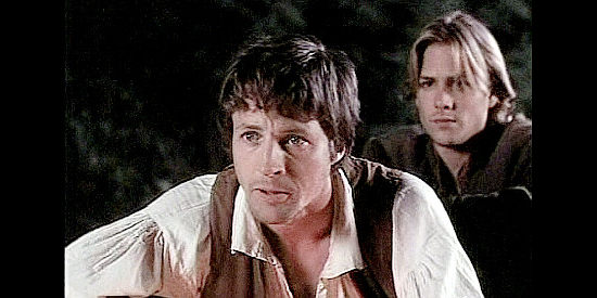 Tim Guinee as Will Ingles and Gabriel Macht as Johnny Draper, trying to arrange a trade to get back the captives in Follow the River (1995)