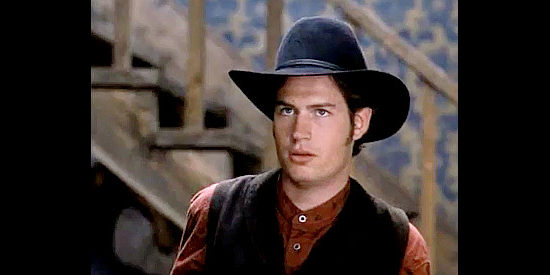 Tristan Tait as Travis Clayborne, one of the four brothers determined to protect Mary Rose in Rose Hill (1997)