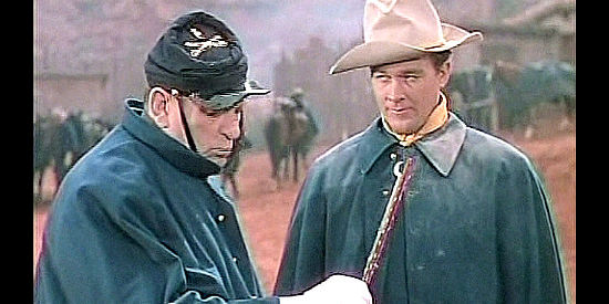 Victor McLaglen as Sgt. Quincannon and Ben Johnson as Sgt. Tyree, trying to identify an Indian arrow in She Wore a Yellow Ribbon (1949)