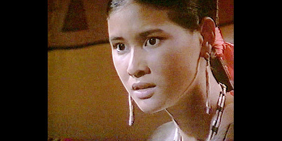Young Alope, hearing the handsome price her father demands for her hand in Geronimo (1993)