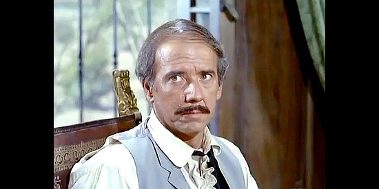 Albert Paulson as Eduardo Nervo, the attorney working on an inventory of the Montoya ranch in New Lion of Sonora (1971)