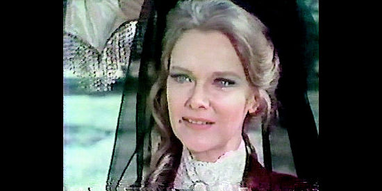 Anne Francis as Flora Dobbs, a lonely widow ready to horse trade with Banjo in Banjo Hackett, Roamin' Free (1976)