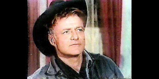 Brian Keith as Johnny Wade, who finds a new job on Georgia Price's ranch in Bull of the West (1972)