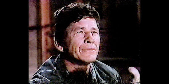 Charles Bronson as Ben Justin, determined to make it on his own in Bull of the West (1972)