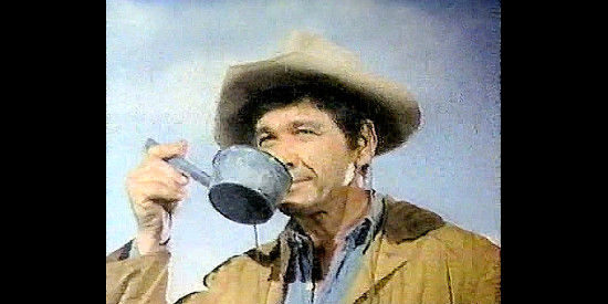 Charles Bronson as Linc Murdock, looking for a drink and finding lovely Maria in Guns of Diablo (1964)