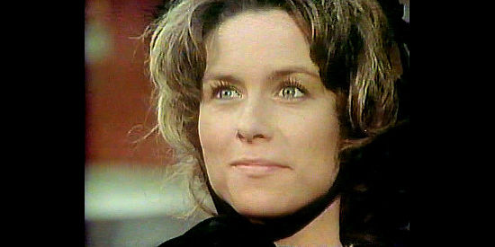 Darleen Carr as Selina Jenson, trying not to fret over the danger her deputy husband faces in Law of the Land (1976)