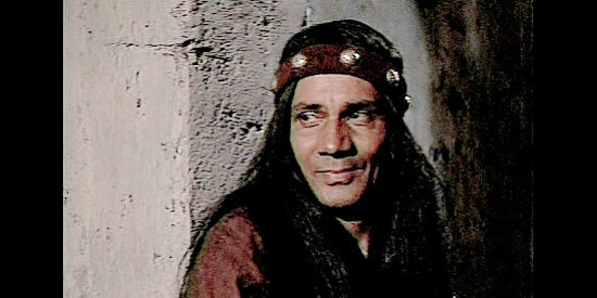 Enrique Lucero as Nacho, Chela male protector in The Wrath of God (1972)