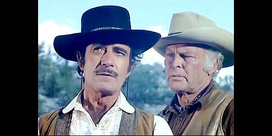 Gilbert Roland as Don Domingo and Leif Erikson as John Cannon discuss how to deal with rustlers in New Lion of Sonora (1971)