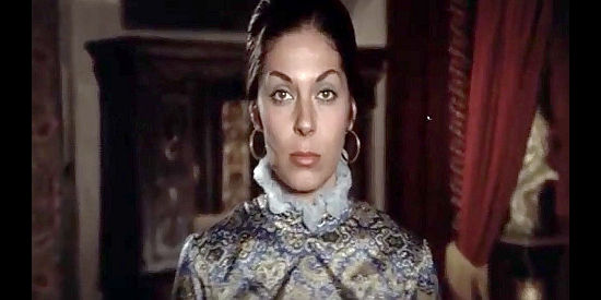 Gladys Vivas as the woman who left her husband for his brother in Guns and Guts (1974) 