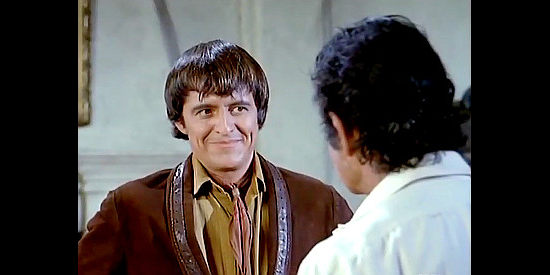 Henry Darrow as Manolito Montoya, trying to convince Don Domingo the Montoya ranch is worth fighting for in New Lion of Sonora (1971)