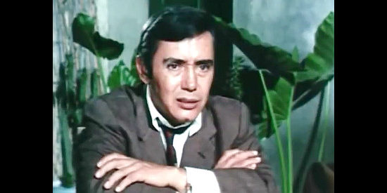 Humberto Almazan as Miguel Pro, in a serious moment with his brother Humberto in Rain for a Dusty Summer (1971)