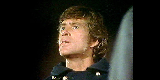 Jim McMullan as Lt. Hollinger, the cavalry officer who had fallen in love with the prostitute who is murder in Law of the Land (1976)