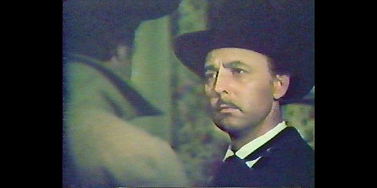John Hillerman as Maj. Walcott, leader of the effort to eradicate the small ranchers in The Invasion of Johnson County (1976)