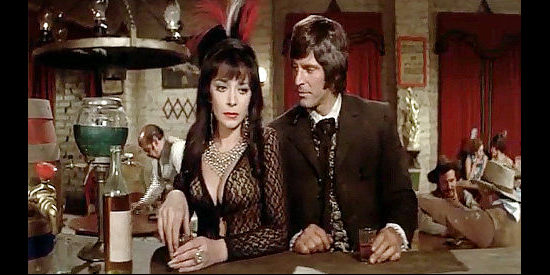 Jorge Rivero as El Pistolero with Zumla Faiad as Chiquita, the one whore he cares about in Guns and Guts (1974)