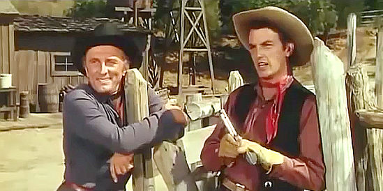 Kirk Douglas as Dempsey Rae and William Campbell as Jeff Jimson shared their opinions on the new boss in Man Without a Star (1955)