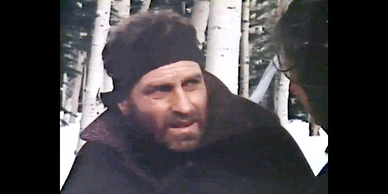 Lance LeGault as Charles Stanton, suffering after a fall into freezing water in Donner Pass, The Road to Survival (1978)