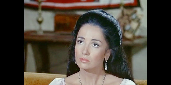 Linda Cristal as Victoria Cannon, learning that Don Domingo plans to sell her late father's property in New Lion of Sonora (1971)