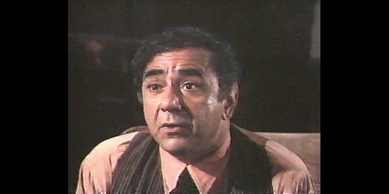 Michael Constantine as Dave Riley, trying to convince Siringo he doesn't know Etta in Wanted The Sundance Woman (1976)