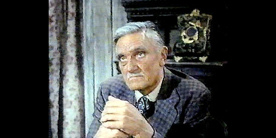 Morris Ankrum as Ray Macklin, owner of the ranch and father of three rowdy sons in Guns of Diablo (1964)