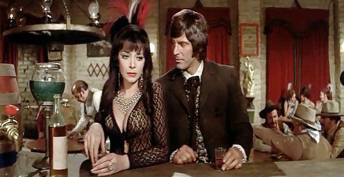 Jorge Rivero as El Pistolero with Zumla Faiad as Chiquita, the one whore he cares about in Guns and Guts (1974)