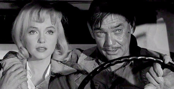 Marilyn Monroe as Roslyn Taber and Clark Gable as Gay Langland, wondering about the future in The Misfits (1961)