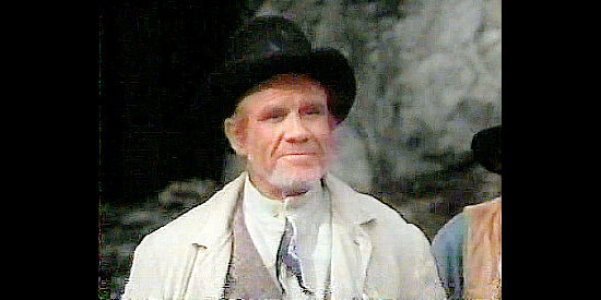 R.G Armstrong as sheriff and judge Harrison, Quantrill's mining partner in The Legend of the Golden Gun (1979)