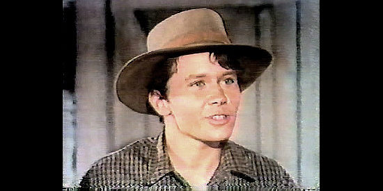 Robert Random as Will Justin, Ben's son, eager to prove his worth in Bull of the West (1972)