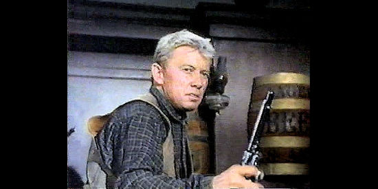 Ron Hagerthy as Carey Macklin, ready to defend his brother Rance in Guns of Diablo (1964)