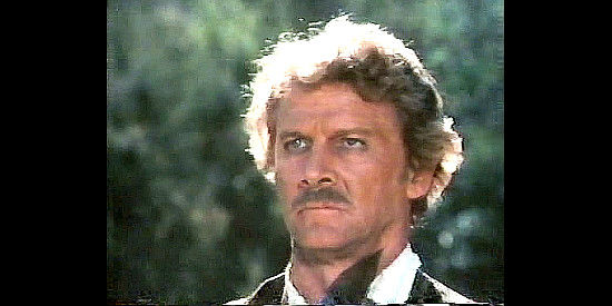 Steve Forrest as Charlie Siringo, finding himself under Pancho Villa's machete in Wanted The Sundance Woman (1976)