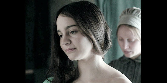 Aisling Franciosi as Claire Carroll, getting prettied up to sing for the soldiers in The Nightingale (2018)