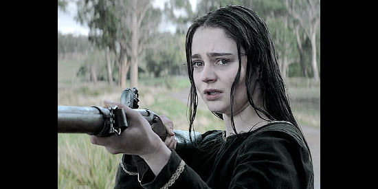 Aisling Franciosi as Claire Carroll, horrified by the treatment of aborigines on the road to town in The Nightingale (2018)