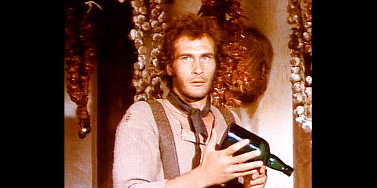 Albert Terracina (Tom Scott) as Napoleon, caught holding another booze bottle drained by Ghost Davy in Whiskey and Ghosts (1974)