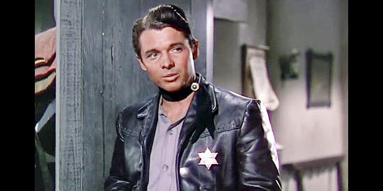 Audie Murphy as Luke Cromwell, aka The Silver Kid, looking for the men who killed his father in The Duel at Silver Creek (1952)
