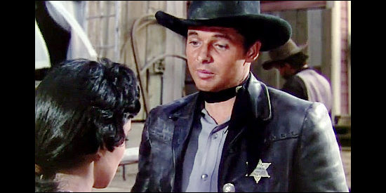 Audie Murphy as The Silver Kid, offering Jane 'Dusty' Fargo some romantic advice in The Duel at Silver Creek (1952)