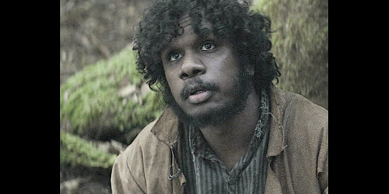 Baykali Ganambarr as Billy Mangana, Claire's reluctant guide in The Nightingale (2018)