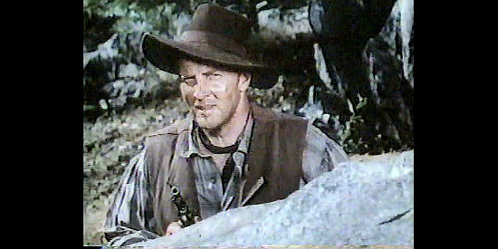 Bruce Bennett as Cole Younger as the posse draws closer in The Great Missouri Raid (1951)
