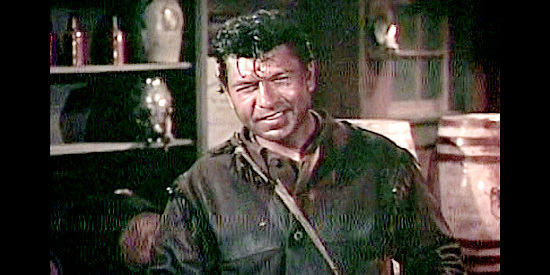 Claude Akins as Caleb Brandt, a trapper in the market for a pretty bride in Frontier Rangers (1959)