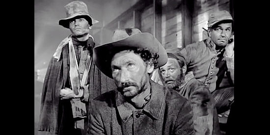 Confederate prisoners, including Sgt. Pickens (Arthur Hunnicutt) and Cy Davis (Noah Beery Jr.), listen to the Union proposal in Two Flags West (1950)