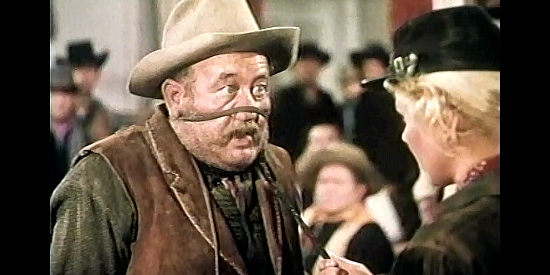 Cubby Johnson as Rattlesnake, the stage drive caught contradicting Jane's tall tales in Calamity Jane (1953)