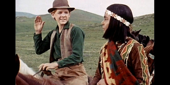 David Stollery as Dan Thompson and Anthony Numkena as Little Thunder exchange greetings in Westward Ho the Wagons! (1956)