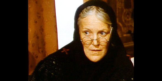 Elsa Zabala as Granny Katie, a woman with a secret after buried treasure in Whiskey and Ghosts (1974)
